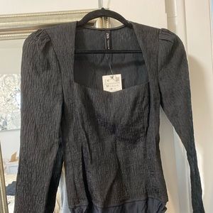 Black long sleeve bodysuit— so cute!